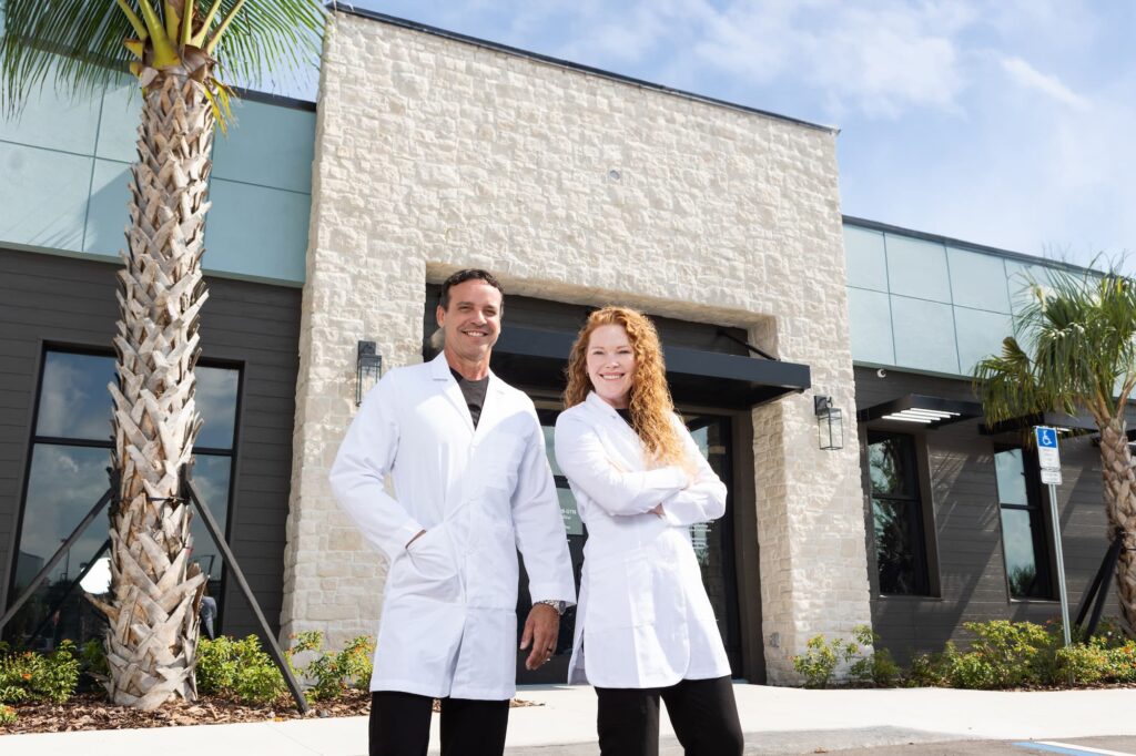 Medical practitioners outside of their OBGYN practice near Windermere, FL